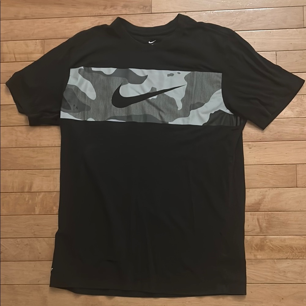 Nike Black and Gray Camouflage Short Sleeve Tee. It has been worn.